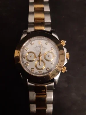 Rlx Daytona klocka stenar & guld detaljer
