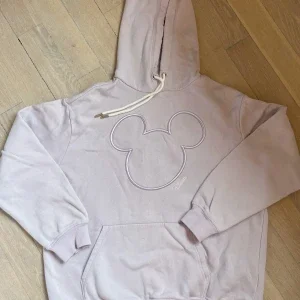 Ljuslila hoodie från disney