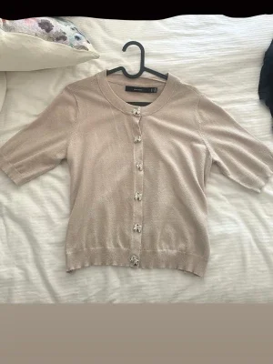 Beige kofta med kort ärm från Vero Moda