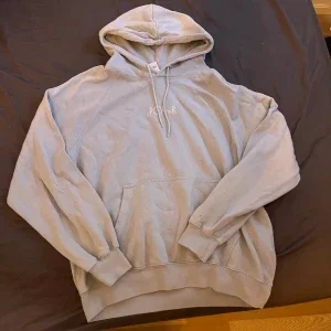 Ljus blå hoodie från Polar