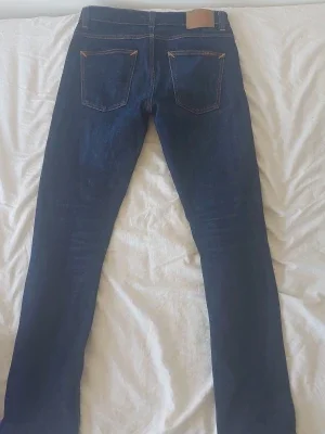 Mörkblå jeans från Nudie Jeans