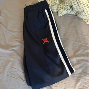 Axel Arigato Bee bird track pants