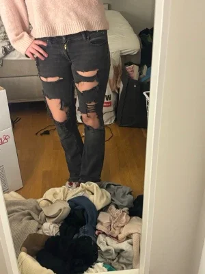 Svarta ripped lee jeans bootcut