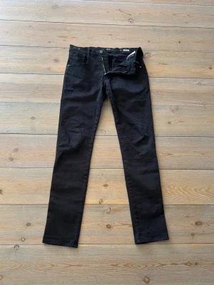 Svarta Replay Anbass jeans - Replay klassiker