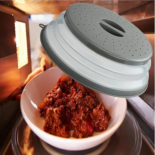 Mikrobølgeovn Sprutdeksel med ventilasjonshull. Dobler som beskyttelse og filter for frukt/grønnsaker. Tåler oppvaskmaskin, BPA-fri, med krokfester. 1
