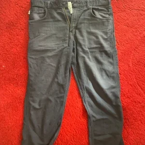 Marinblå Carhartt Jeans