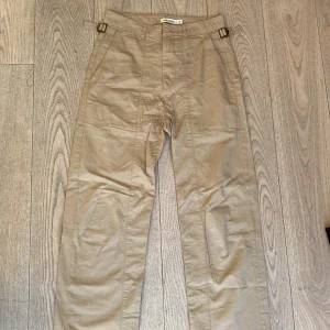Carin Wester beige byxor stl 38