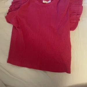 Rosa volang topp