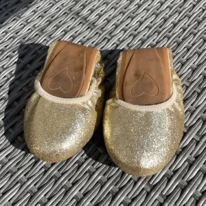 Ihopvikbara Glittriga guldiga ballerinaskor