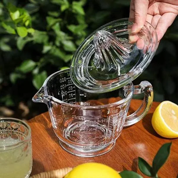 1 stk. Allsidig målebeger i glass for juice med håndtak - Manuell sitruspresse for appelsiner, sitroner og mer - Kreativt kjøkkenredskap for pressing