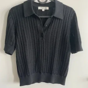 Svart stickad pikétröja Uniqlo