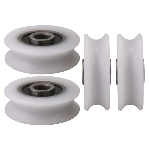 Fyra vita 4 mm innerdiameter U-formade spår nylonhjul, lämpliga för skjutdörrar.
