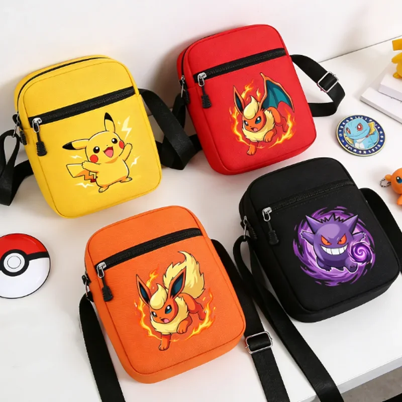 AliExpress - Sac bandoulière Pokémon en tissu Oxford, sacs de sport et de randonnée décontractés, pochette pour téléphone portable Pikachu Gengar, 