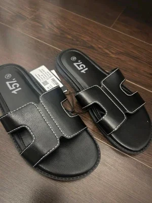 Svarta slip-in sandaler från 157