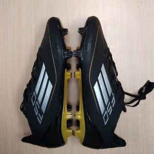 Adidas F50 Messi fotbollsskor svart/guld