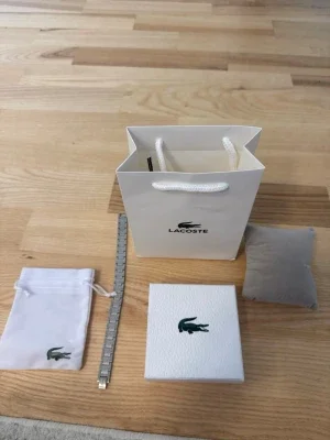 Silver Lacoste armband