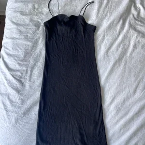 Svart stretchig klänning