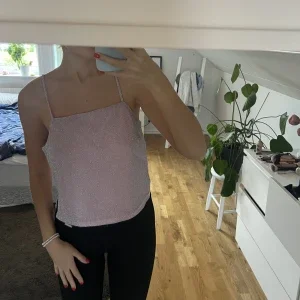 Glittrig rosa topp