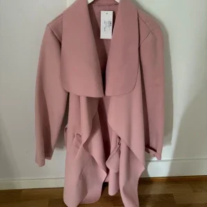 Lång kappa rosa