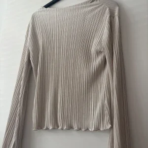 Blus från MQ