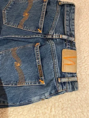 Nudie Jeans blå raka jeans W24 L30
