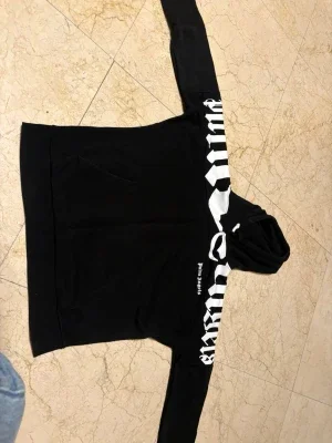 Svart hoodie från Palm Angels