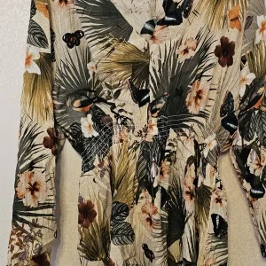 Blommig långärmad klänning H&M