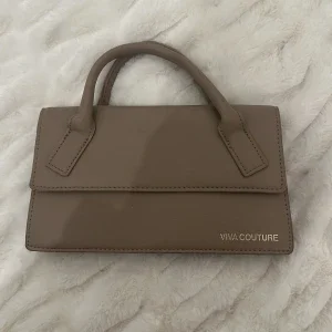 Beige handväska från Viva Couture