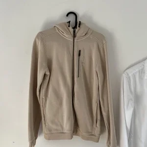Beige sail racing hoodie med dragkedja