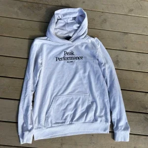 Vit hoodie från Peak Performance