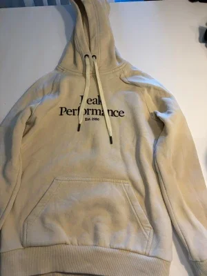 Beige Peak Performance hoodie