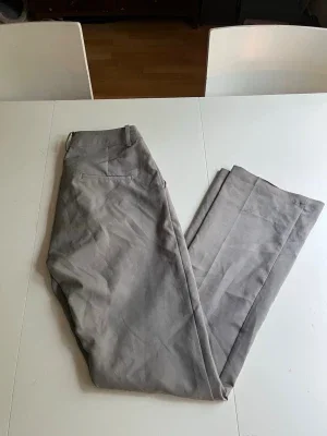 Hög midjade kostymbyxor