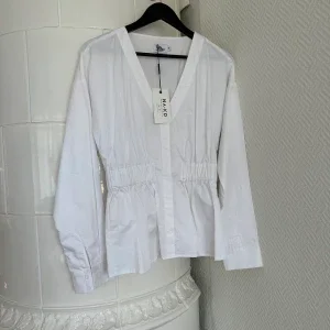 Blus i bomull