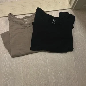 Svart och beige topp från 157
