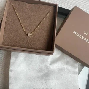 Mockberg halsband med guldton och sten