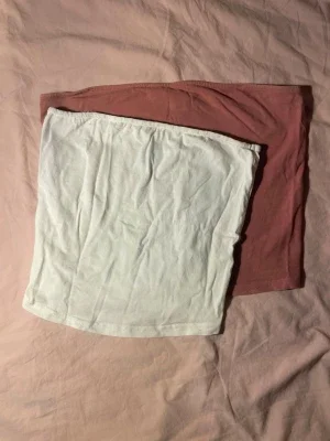 Två tubtoppar i vitt och rosa (XS/S)