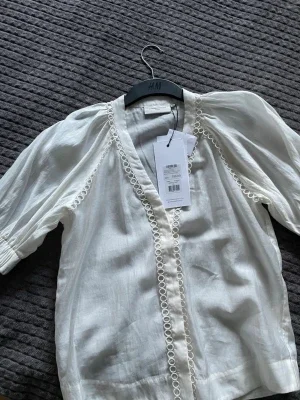 Vit blus från Copenhagen Muse