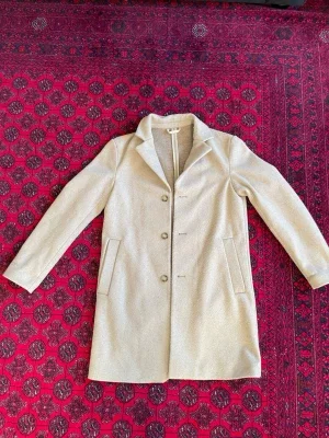 Beige ullkappa från H&M
