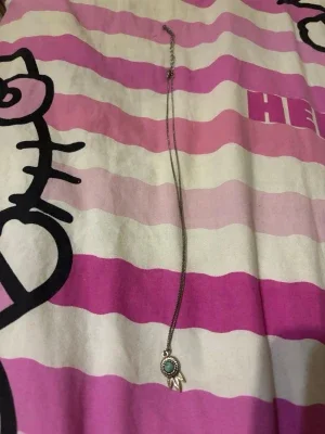 Silverhalsband med turkos sten