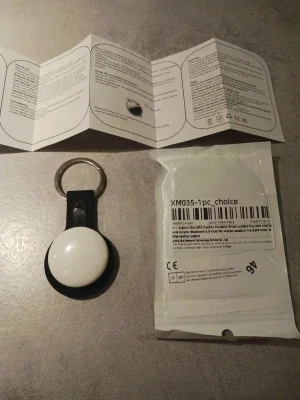 Vit GPS-tracker med nyckelring