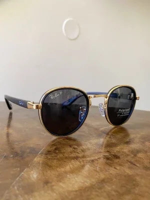 Ray-Ban runda solglasögon guld/svart