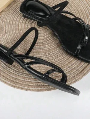 Svarta sandaler med remmar
