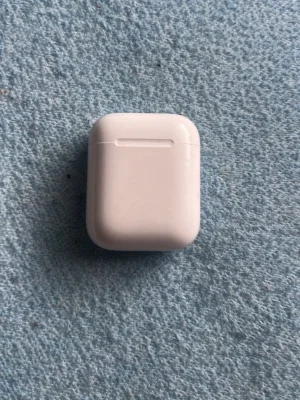 Trådlösa vita hörlurar Apple AirPods