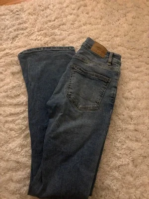 Blåa Perfect Jeans bootcut dam