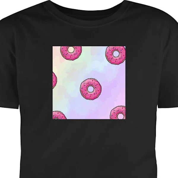 Barn-T-shirt | Bekväm T-shirt för Barn Svart 9-11 År Färgglada rosa donuts med strössel på mjuk pastellbakgrund för lekfull och söt stil