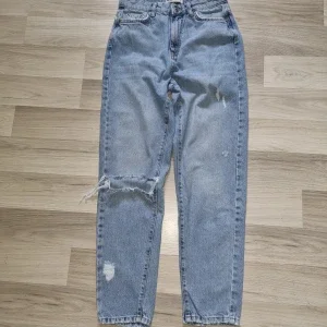 Ljusblå vintage jeans från Gina Tricot