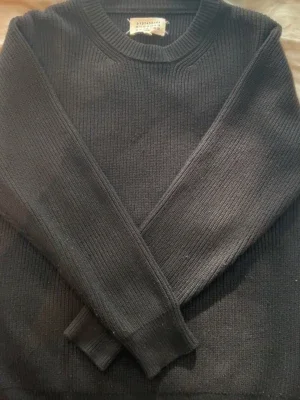 Svart stickad tröja från maison margiela