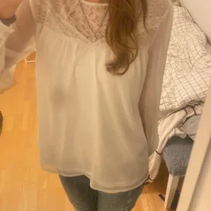 Vit blus