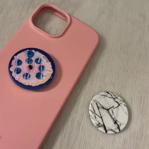 Två popsockets marmor- donut mönster