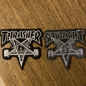 Thrasher logo tygmärke